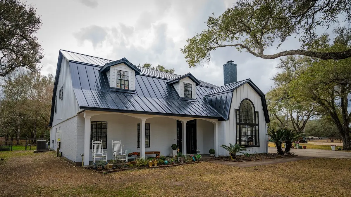 Video thumbnail: Modern Farmhouse Exterior: Black Standing Seam Metal Roof and Metal Siding