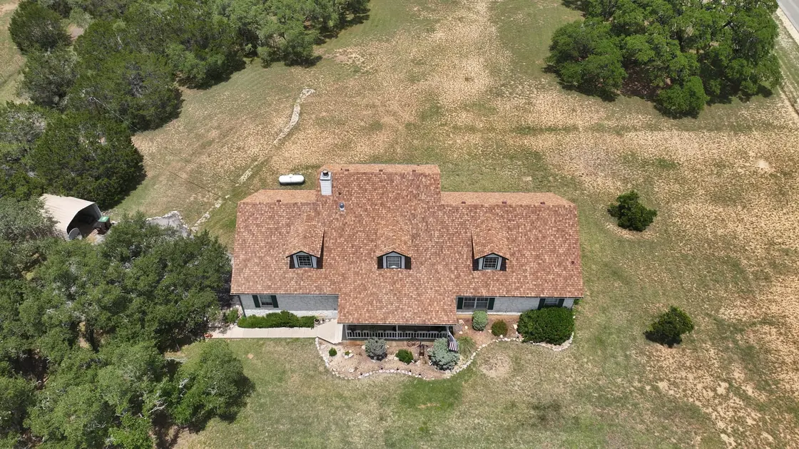 Aerial view of a clay tile roof on a residential home