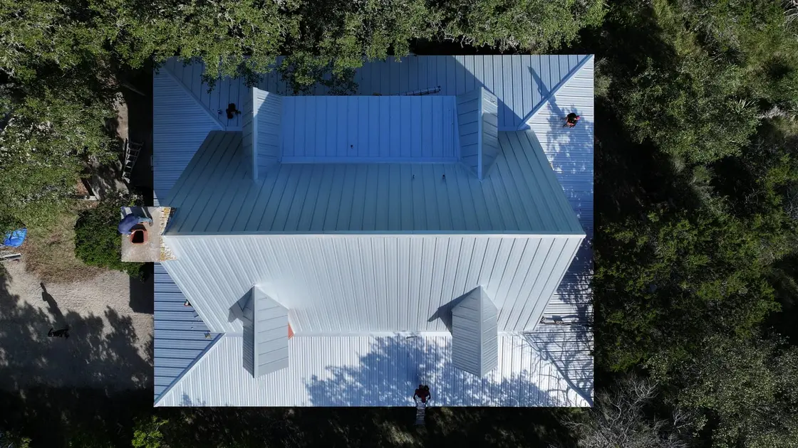 Aerial view of a residential standing seam metal roof
