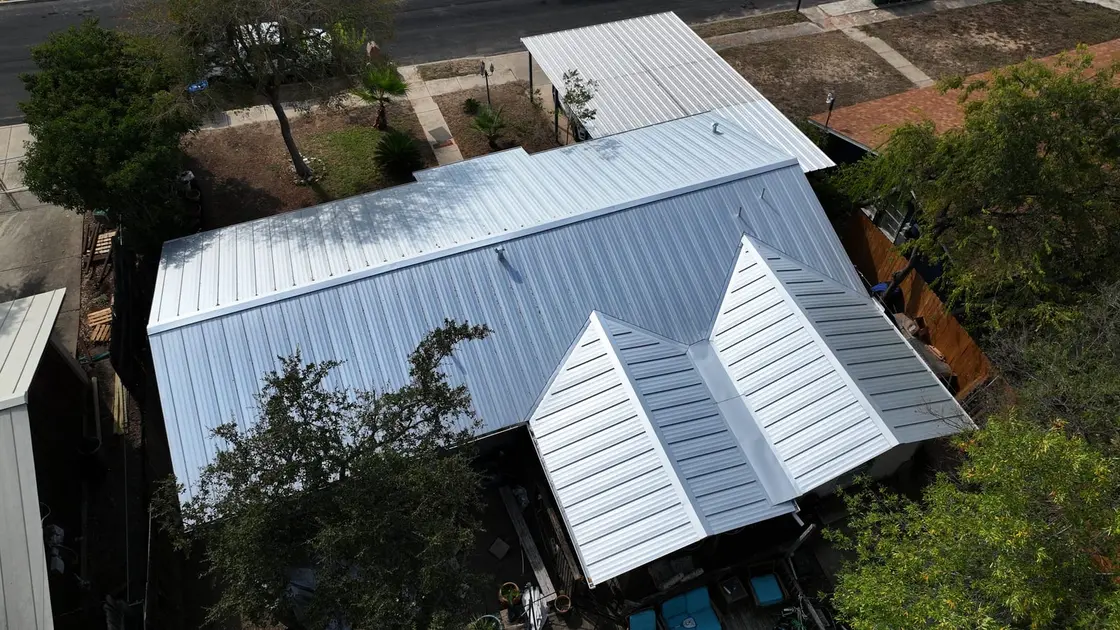 Gabled residential home with a standing seam metal roof