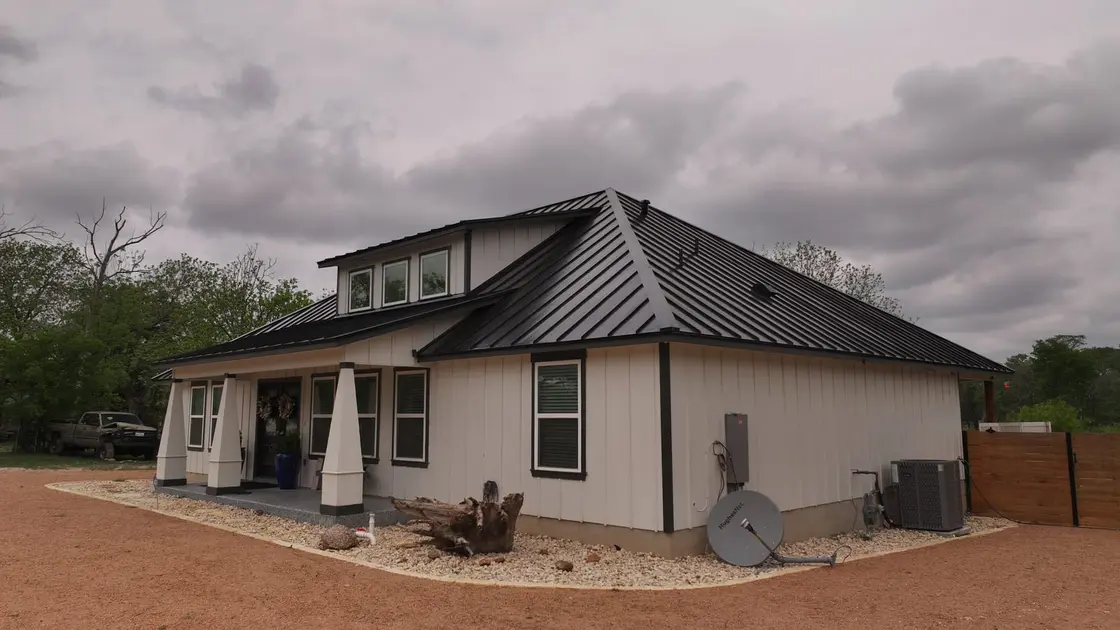 Modern Texas home with a standing seam metal roof