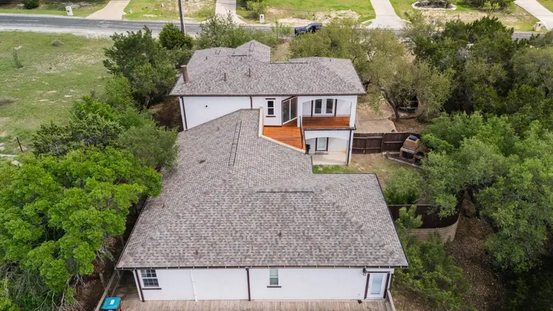 An architectural asphalt-shingle roof ARP installed in Kerrville — the workhorse choice for a Kerr County home, sealed and nailed for Texas Hill Country hail.