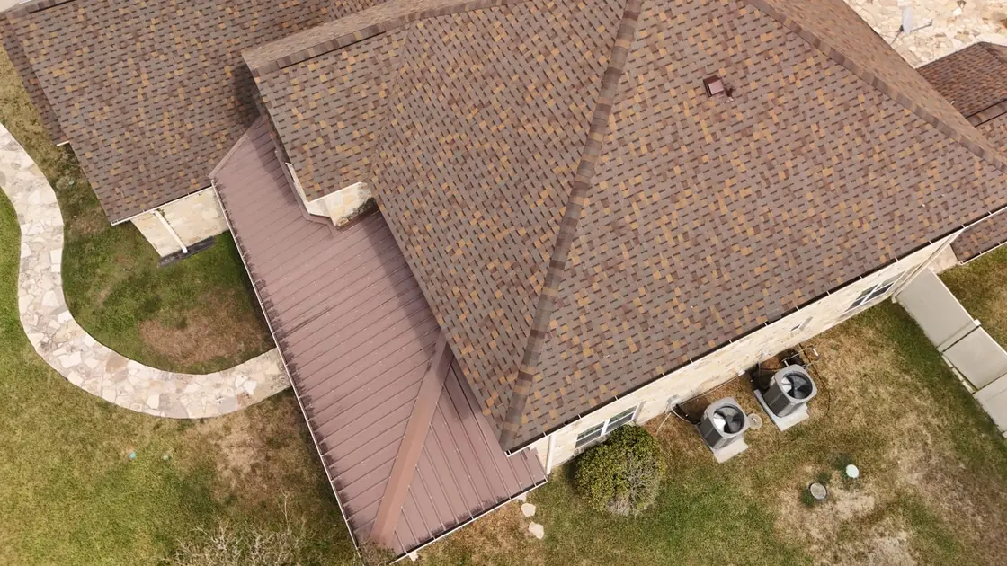 Aerial view of a Texas residential roof taking full sun exposure