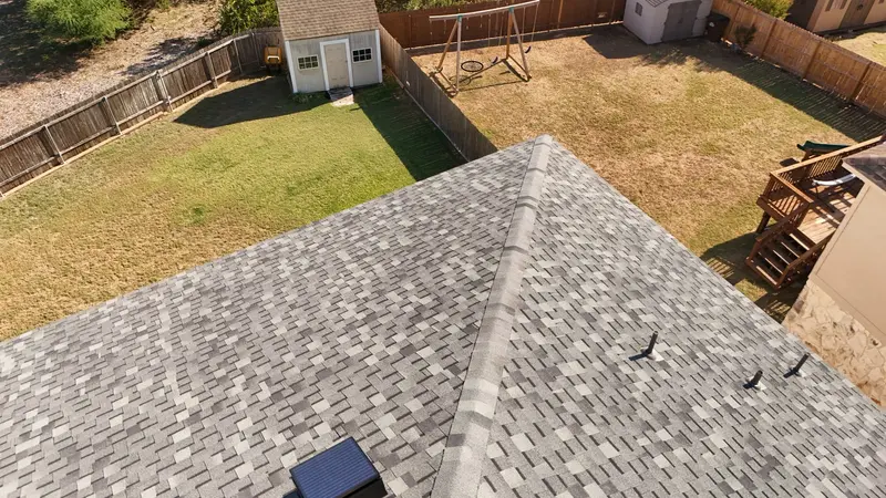 A gray architectural-shingle roof ARP replaced on a Kerr County home — the workhorse system built to stand up to Texas heat and Kerr County hail.