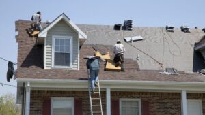 roofers replacing a roof in San Antonio, TX